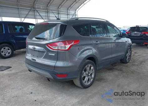 2014 Ford Escape Titanium z USA, uszkodzony, nr VIN 1FMCU0J9XEUE11657